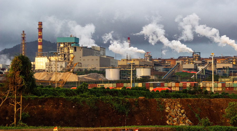 The Harita High Pressure Acid Leaching (HPAL) plant on Obi Island. Red soil in foreground is laterite (Photo: JATAM/ Rifki Anwar)